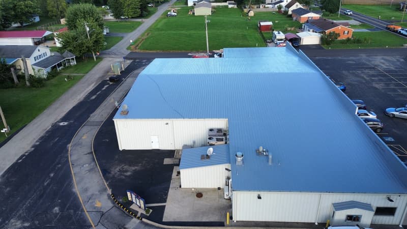 Aerial view of blue metal commercial roof