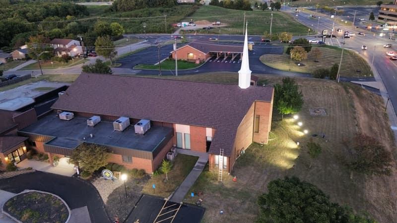 Aerial view of church roof at dusk
